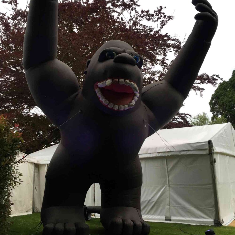 Inflatable gorilla towering over marquees