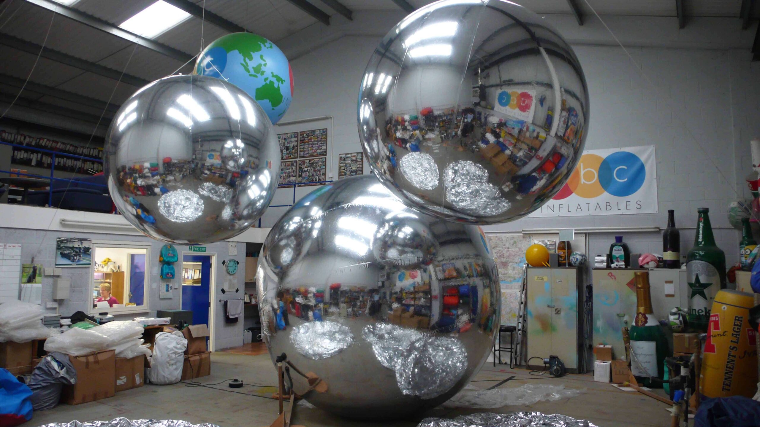 different sizes silver chrome inflatable spheres
